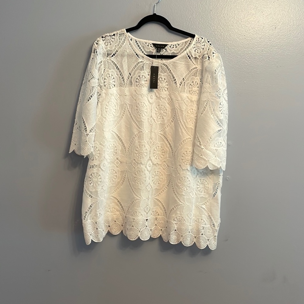 White Adiva lace shirt with full sleeves. Sheer neckline and sleeves. NWT